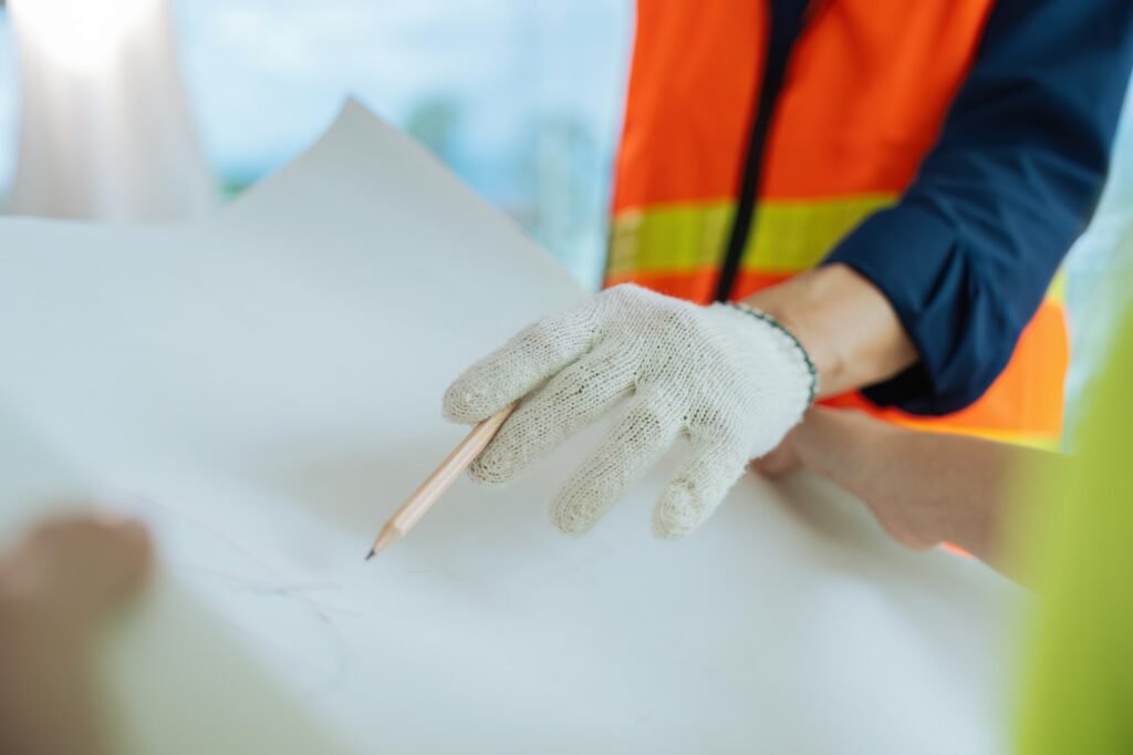 Construction and structure of Engineer or architect discuss blueprint for project working with